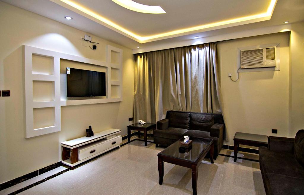 TV a/nebo společenská místnost v ubytování Dreams Houses furnished Suites