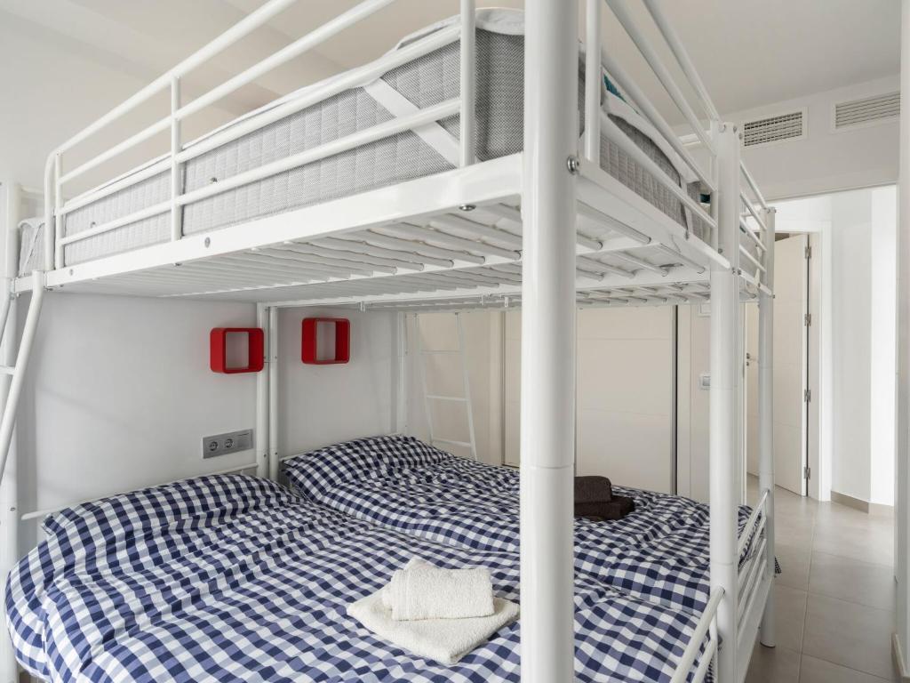 Postel nebo postele na pokoji v ubytování Belvilla by OYO Casa Bali 11