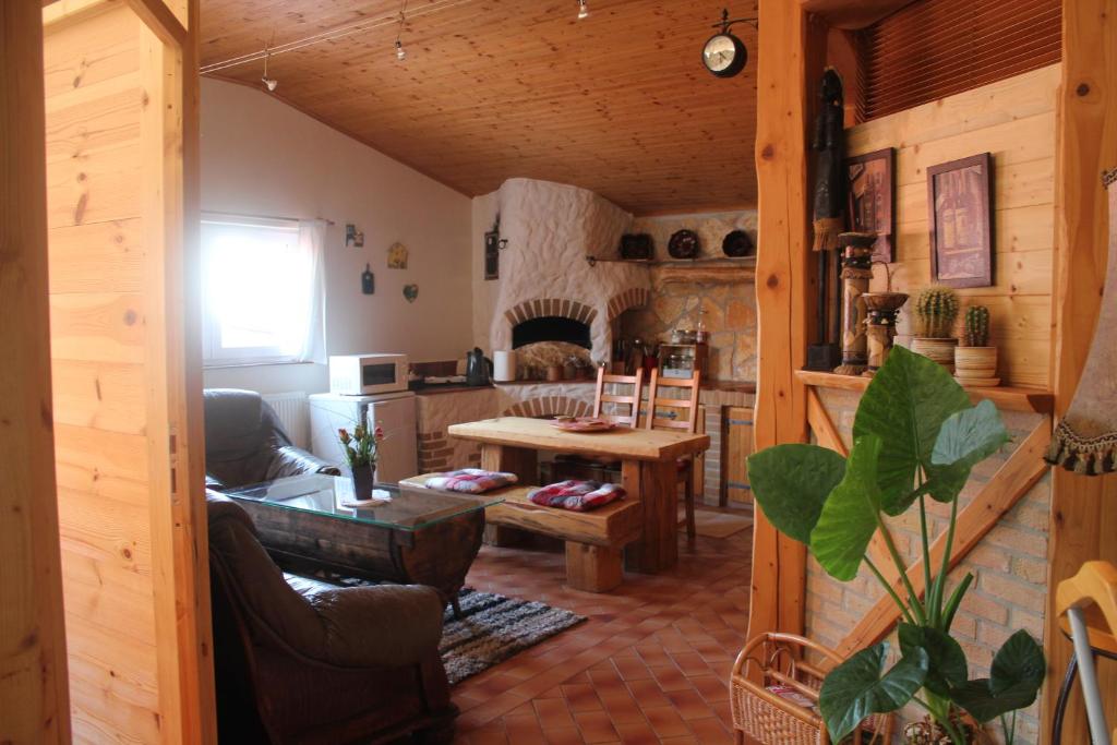 a living room with a couch and a table at Ubytování v soukromí Klima in Český Krumlov