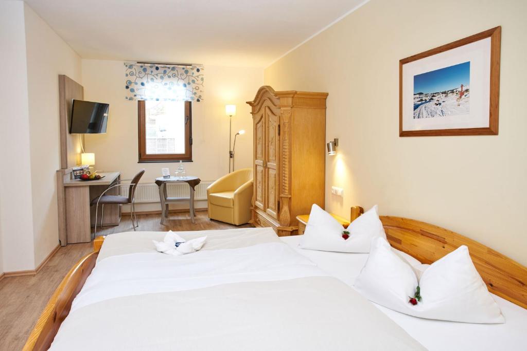 Postel nebo postele na pokoji v ubytování Vulkanhotel balance&selfness ***S