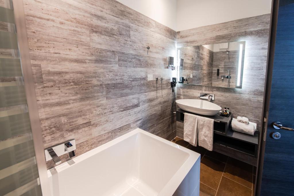 Koupelna v ubytování premium by GS Hotel