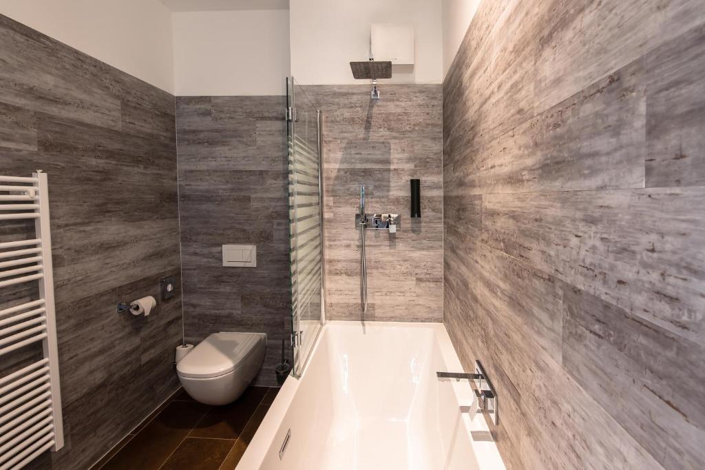 Koupelna v ubytování premium by GS Hotel