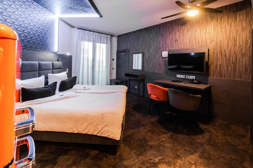 Postel nebo postele na pokoji v ubytování premium by GS Hotel