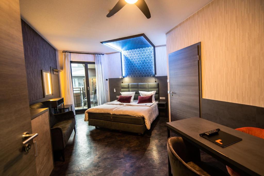Postel nebo postele na pokoji v ubytování premium by GS Hotel