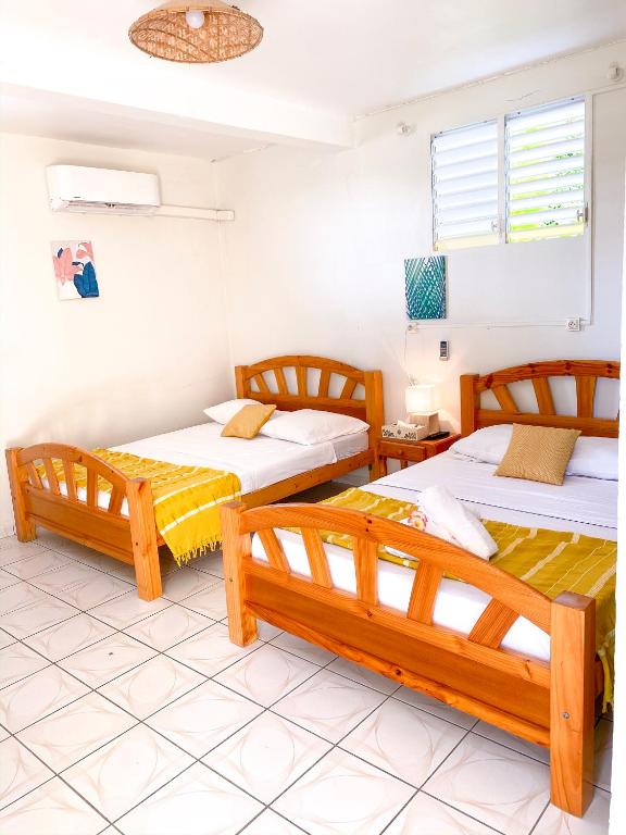 Postel nebo postele na pokoji v ubytování Hotel Oasis