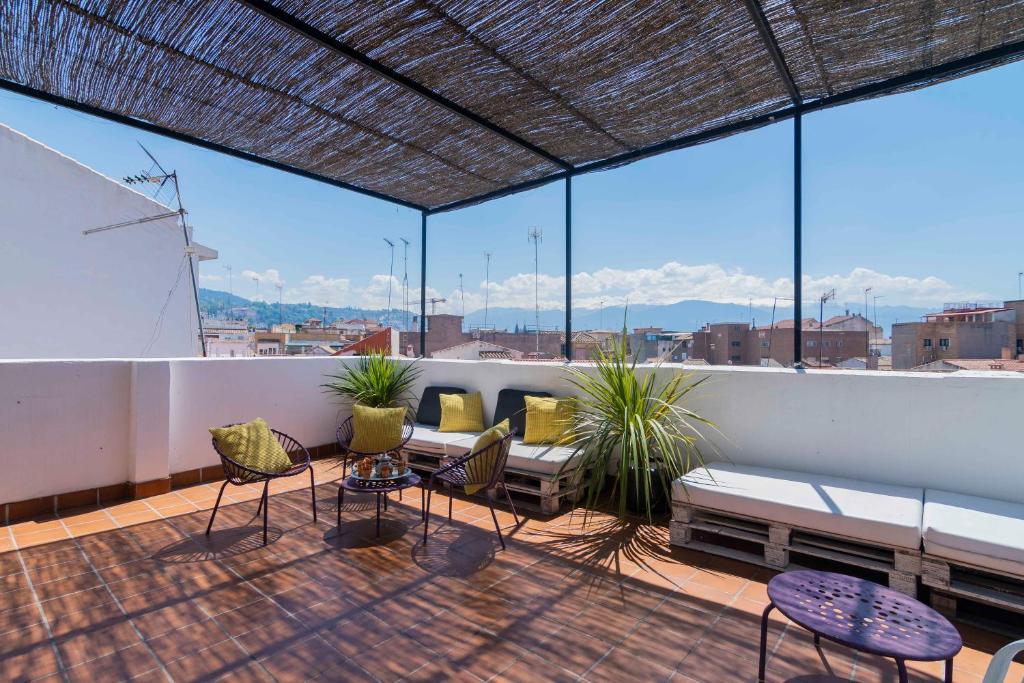 En balkon eller terrasse på Casa Montalbán Apartamentos Turísticos