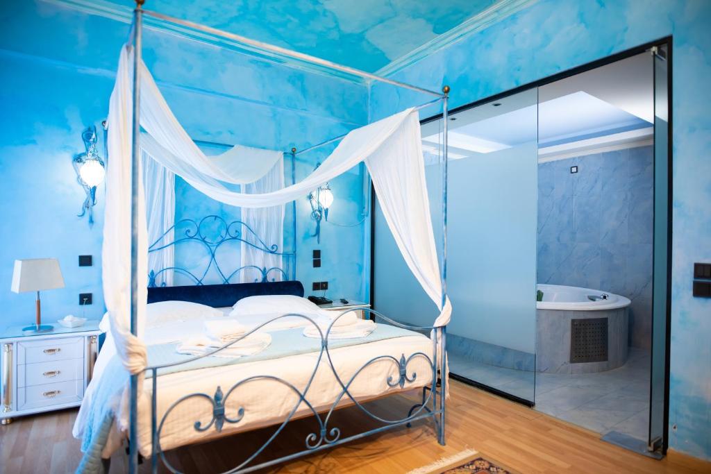 Posteľ alebo postele v izbe v ubytovaní Anastazia Luxury Suites & Spa