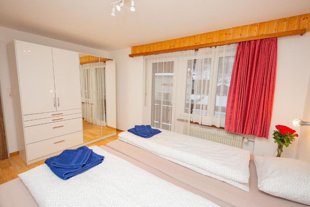 Postel nebo postele na pokoji v ubytování Haus City