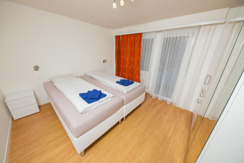 Postel nebo postele na pokoji v ubytování Haus City