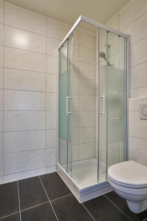 Koupelna v ubytování Haus City