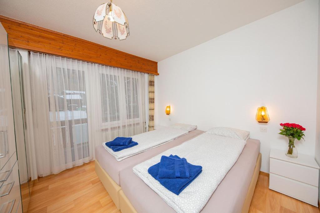 Postel nebo postele na pokoji v ubytování Haus City