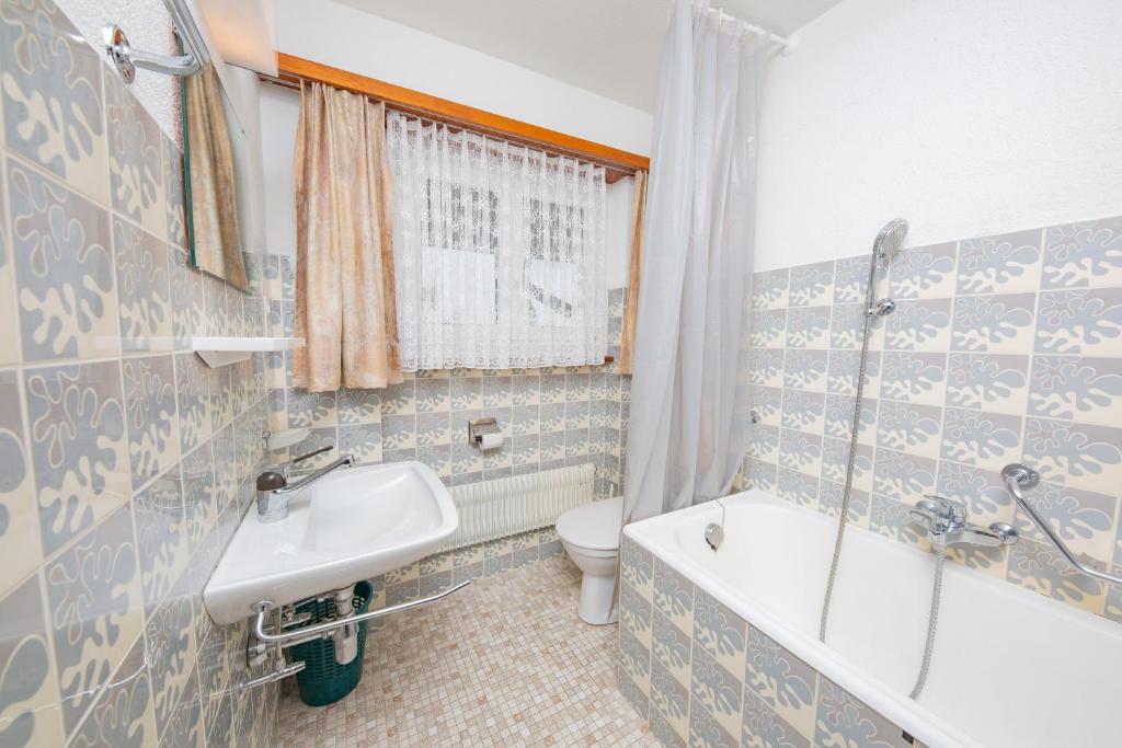 Koupelna v ubytování Haus City
