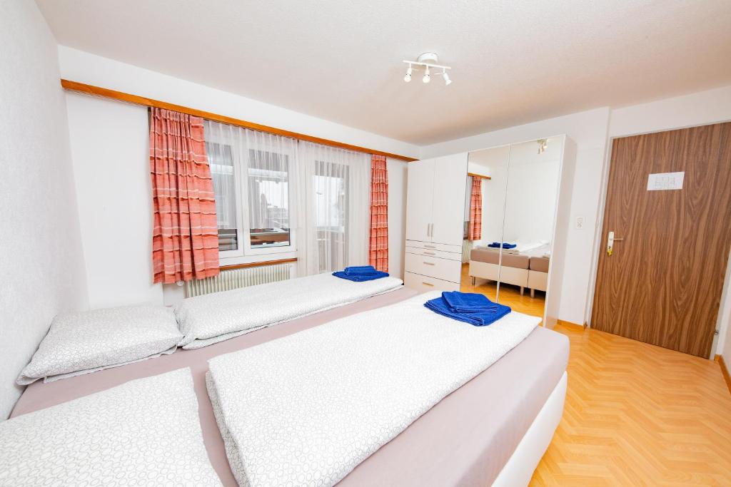 Postel nebo postele na pokoji v ubytování Haus City