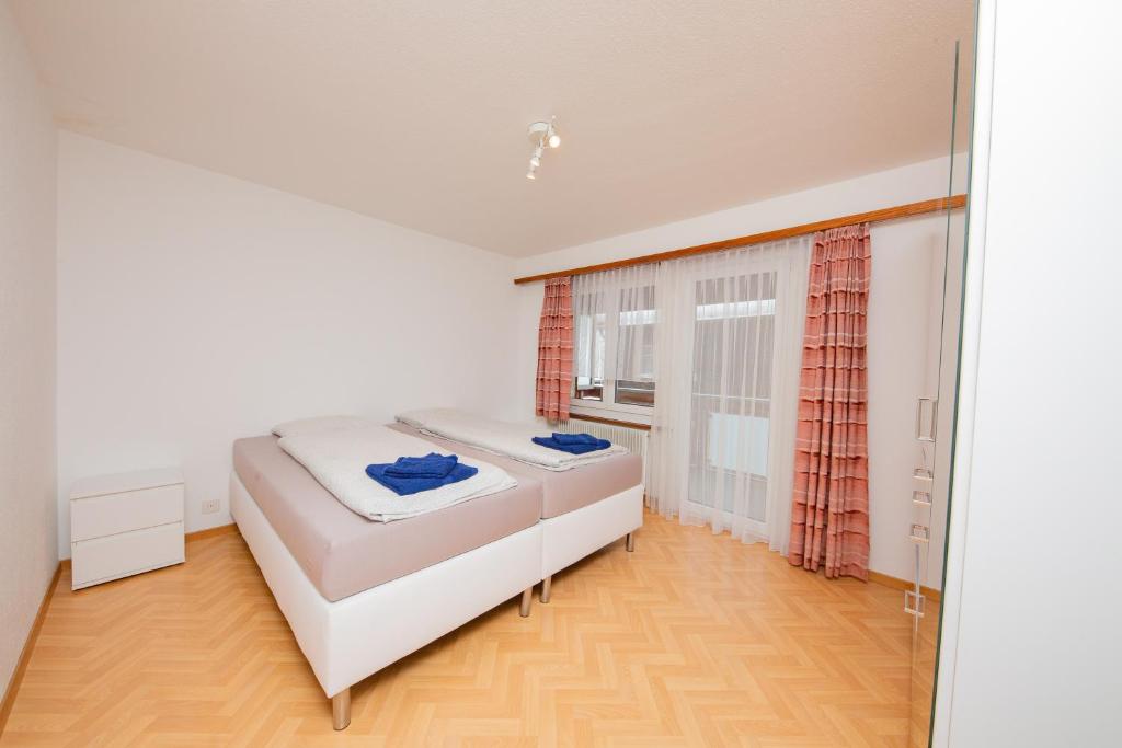 Postel nebo postele na pokoji v ubytování Haus City