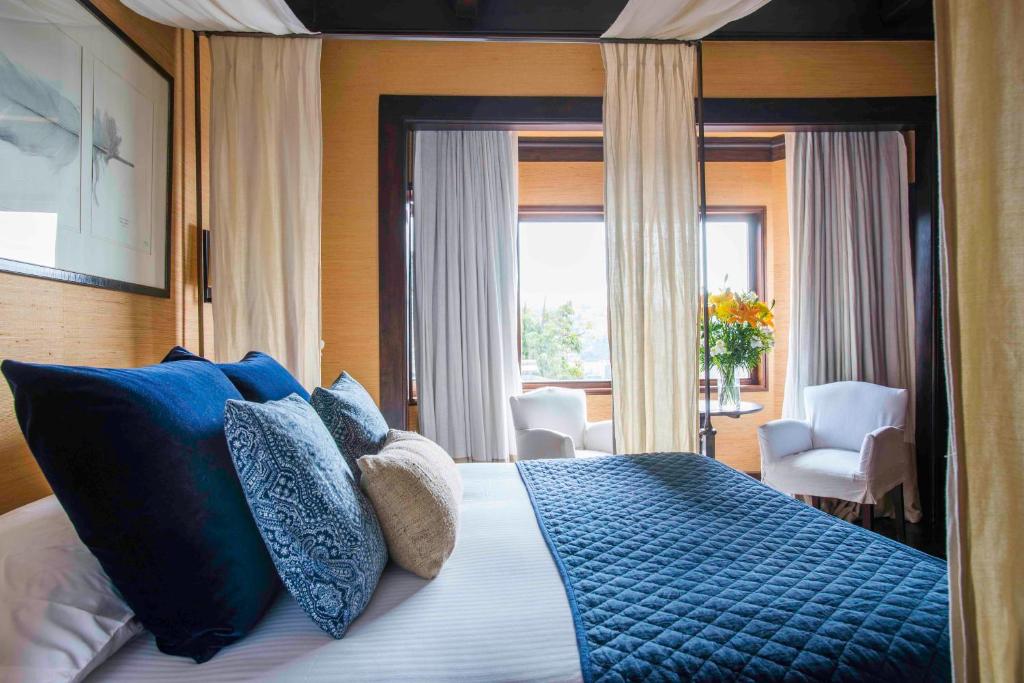 Postel nebo postele na pokoji v ubytování Hotel Casa Higueras