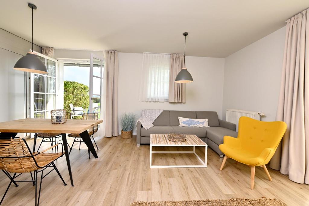 Posezení v ubytování Hotel- & Ferienanlage Kapitäns-Häuser Breege