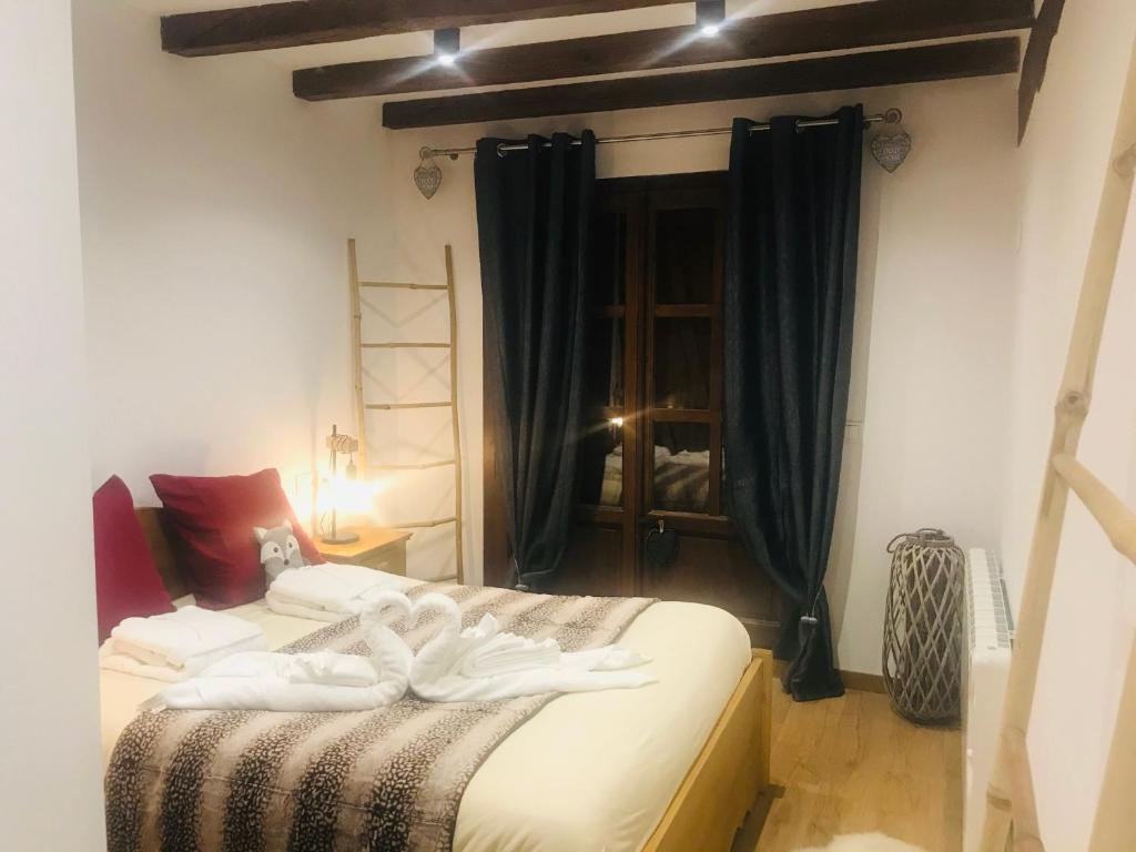 Postel nebo postele na pokoji v ubytování Vall del Riu - Llar dolça llar HUT07815