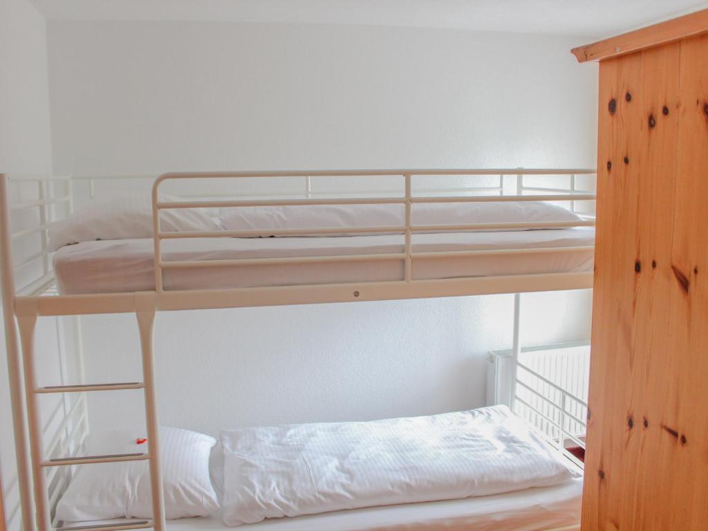 Postel nebo postele na pokoji v ubytování Chalet Rotenstein