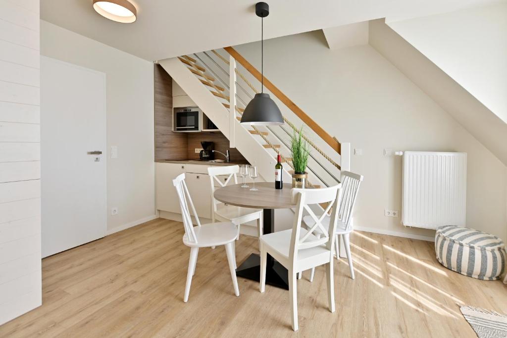 Kuchyň nebo kuchyňský kout v ubytování Hotel- & Ferienanlage Kapitäns-Häuser Breege