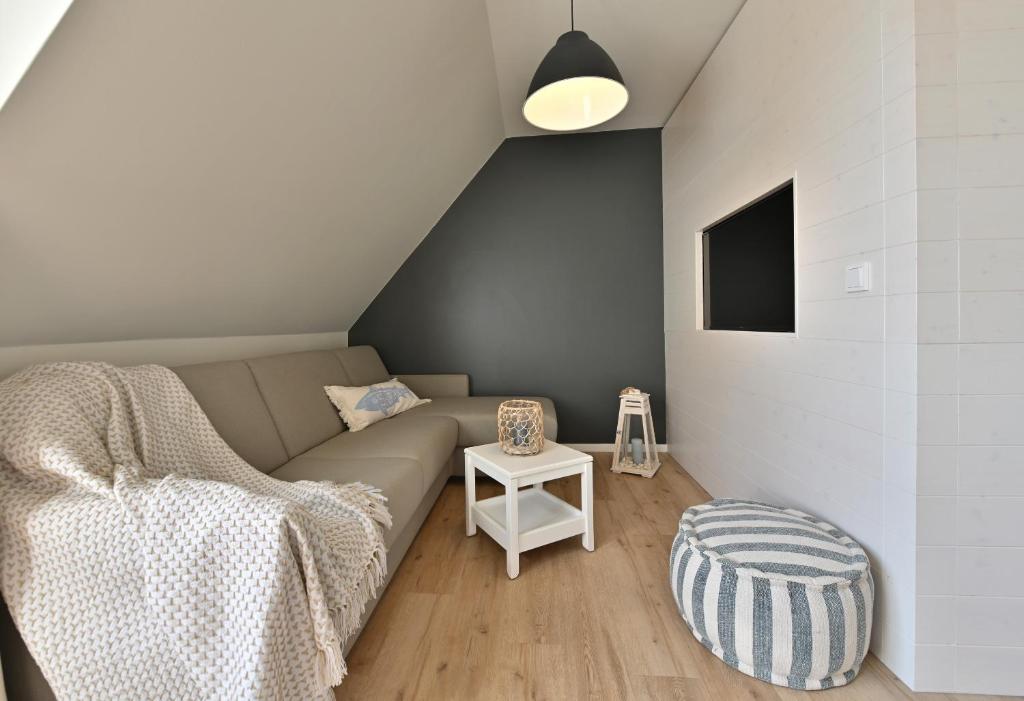 Posezení v ubytování Hotel- & Ferienanlage Kapitäns-Häuser Breege