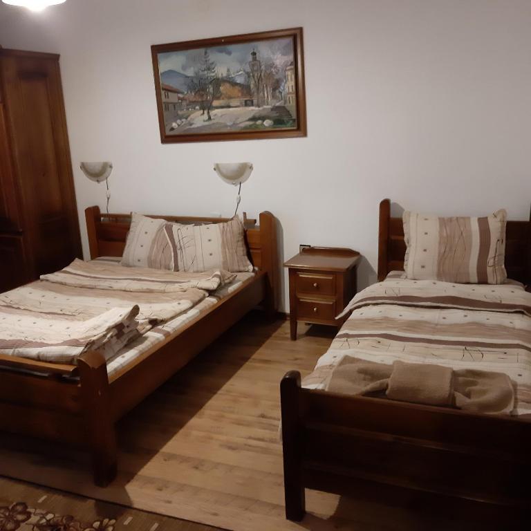 Postel nebo postele na pokoji v ubytování Hadji Georgi Hotel