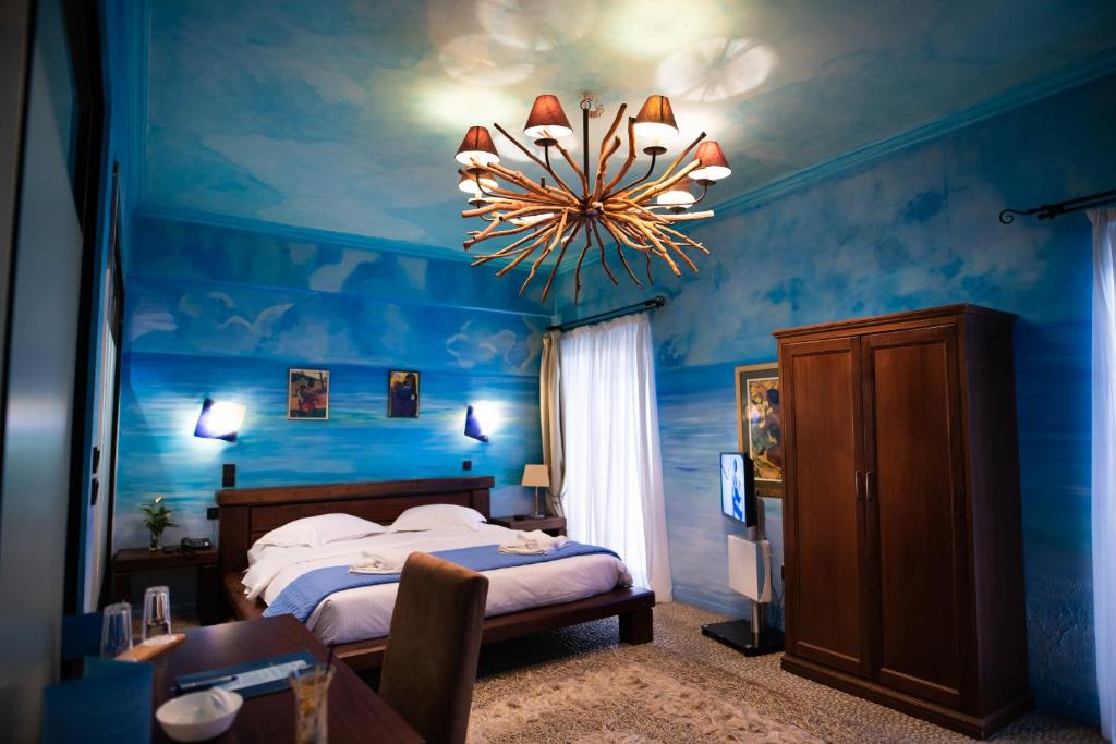 Posteľ alebo postele v izbe v ubytovaní Anastazia Luxury Suites & Spa