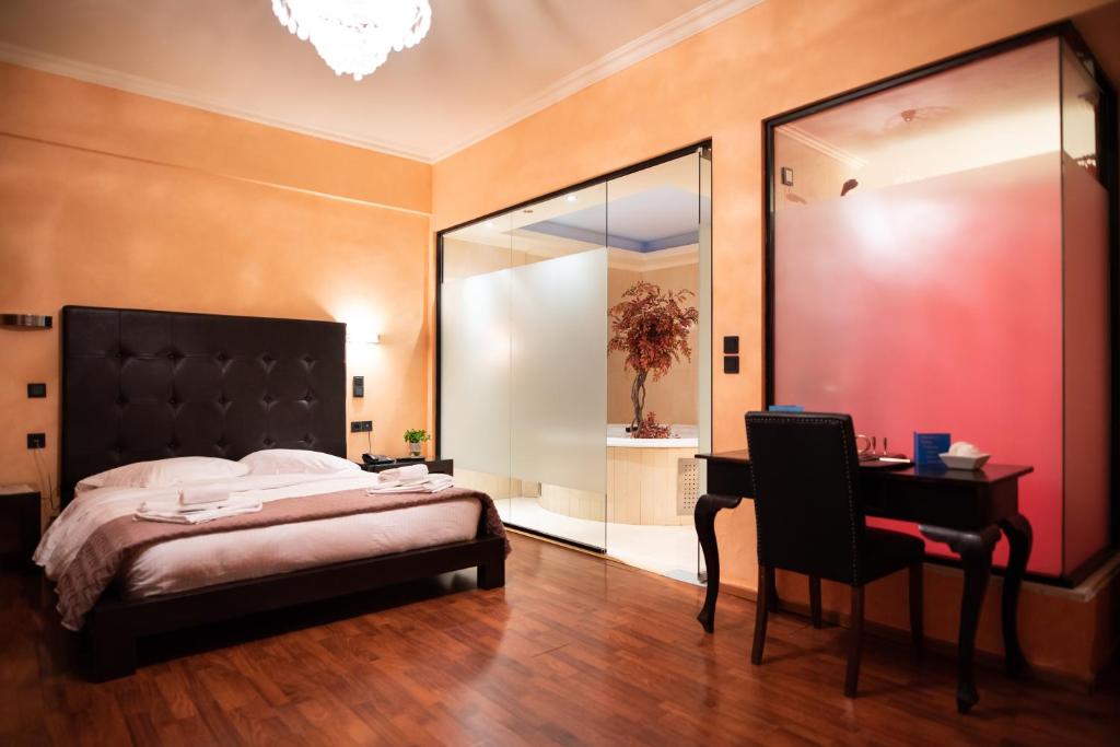 Posteľ alebo postele v izbe v ubytovaní Anastazia Luxury Suites & Spa