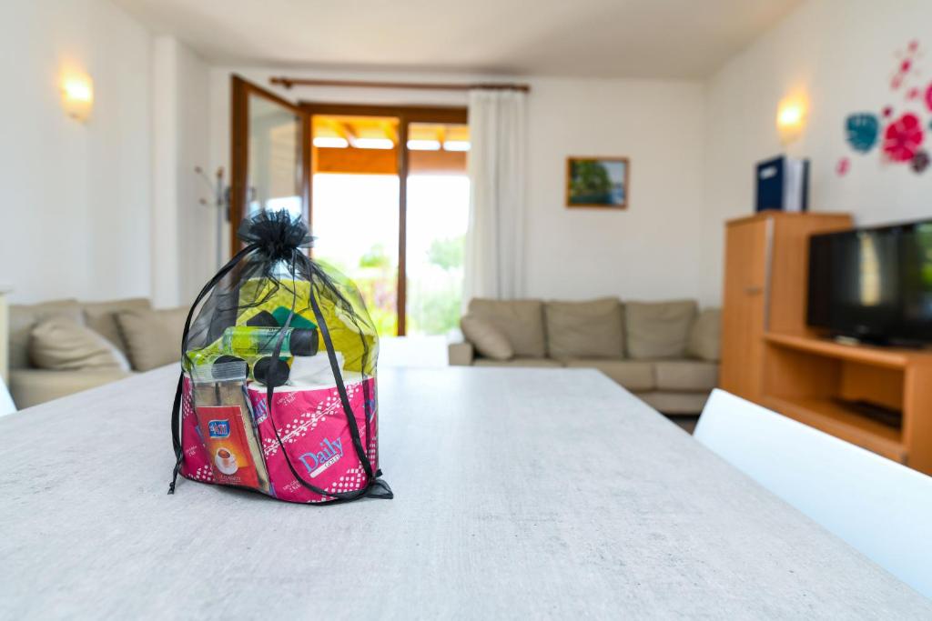 Televízia a/alebo spoločenská miestnosť v ubytovaní Relais Rosa Dei Venti -Ciao Vacanze-