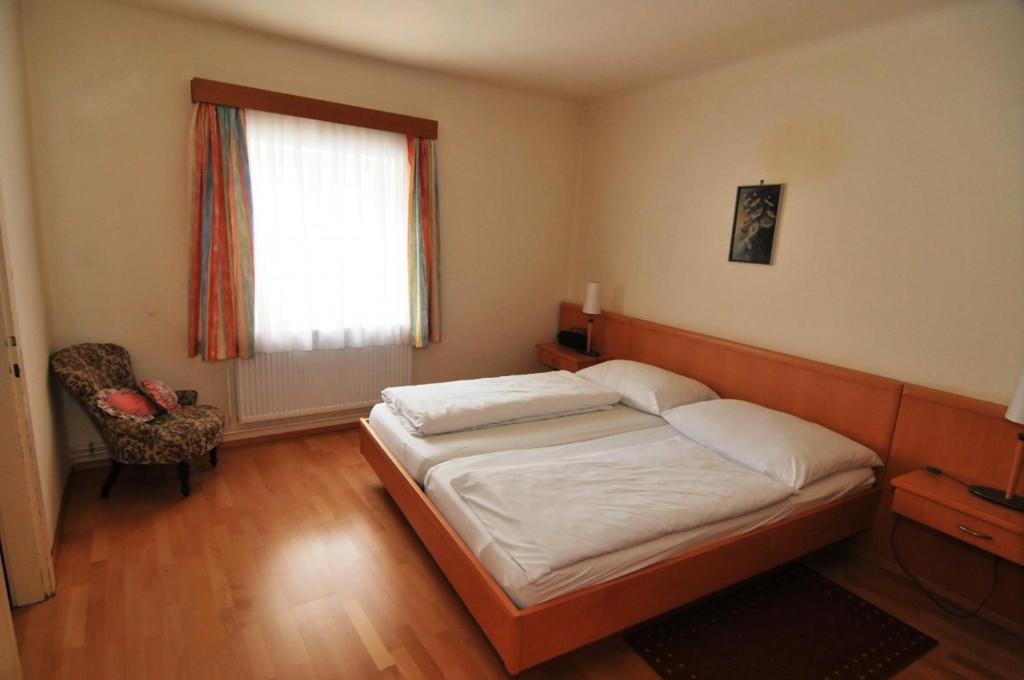 Postel nebo postele na pokoji v ubytování Gästehaus Einzinger