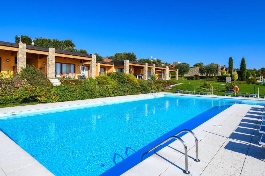 Bazén v ubytovaní Relais Rosa Dei Venti -Ciao Vacanze- alebo v jeho blízkosti