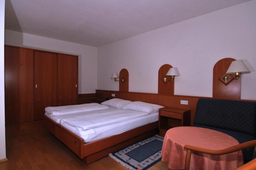Postel nebo postele na pokoji v ubytování Gästehaus Einzinger