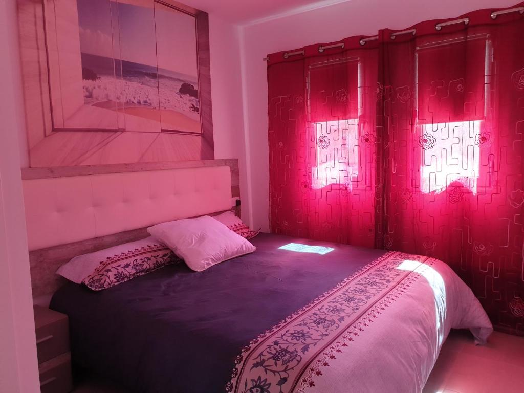 A bed or beds in a room at Sun Edelweiss