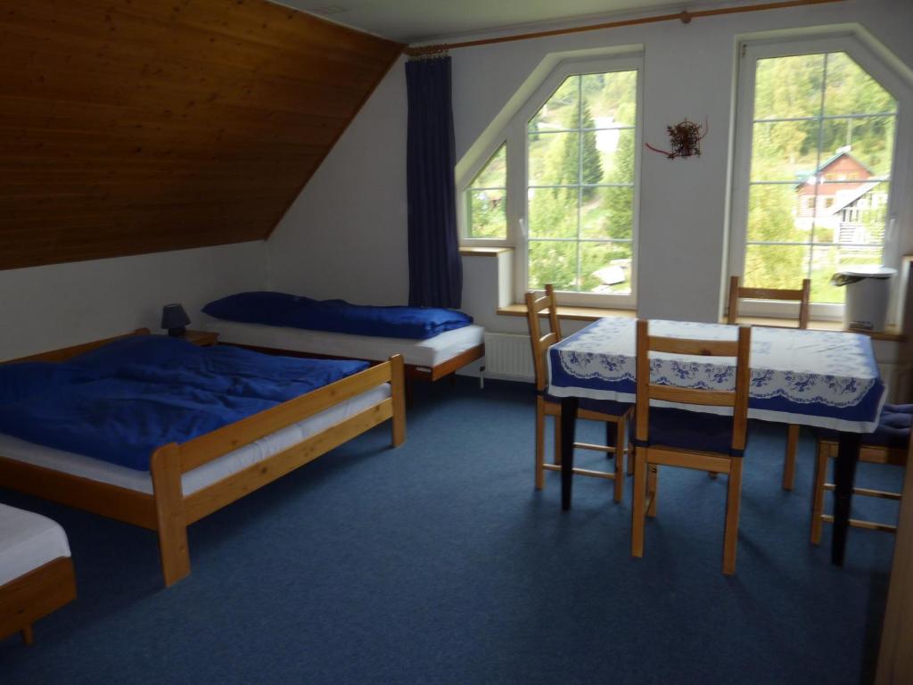 A bed or beds in a room at Niky