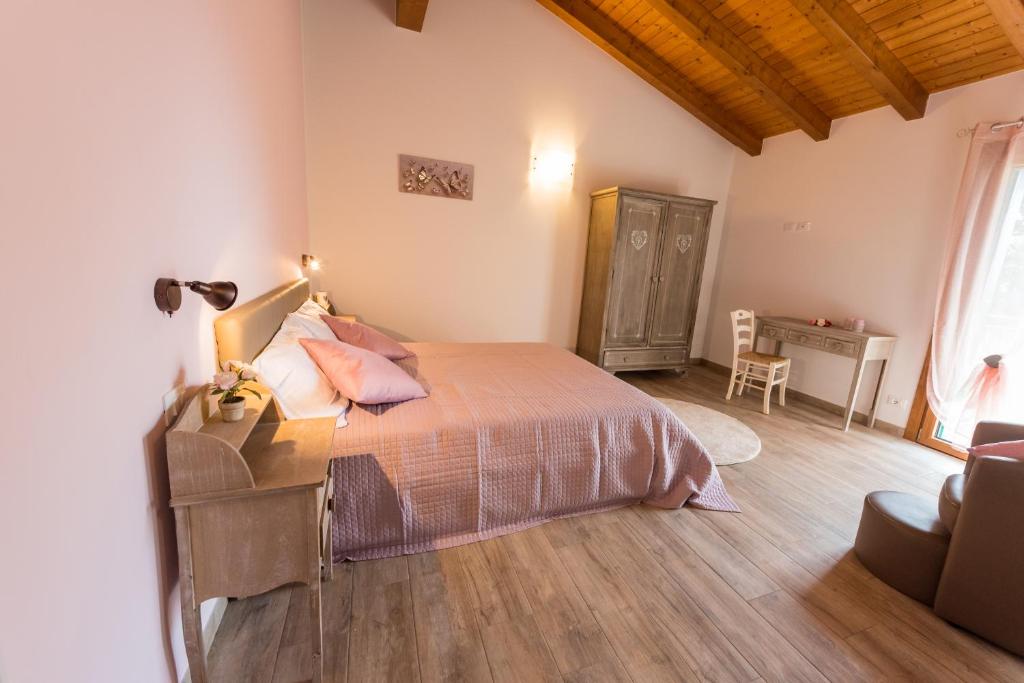 Postel nebo postele na pokoji v ubytování Sara&Sara alloggio agrituristico