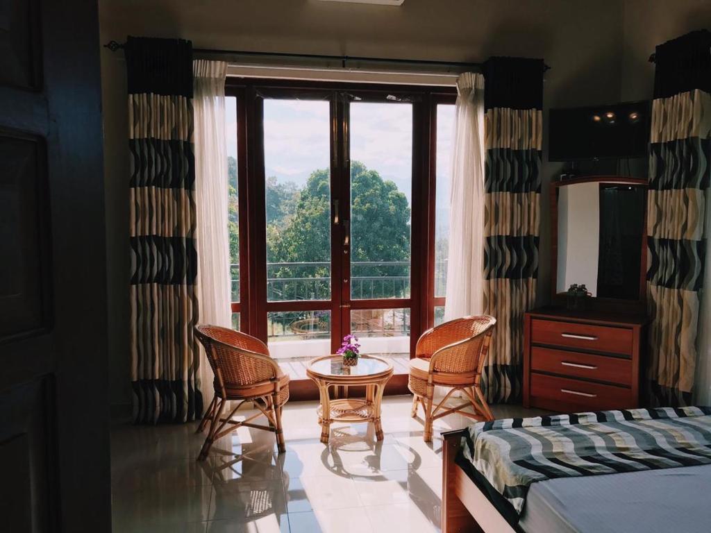 Posezení v ubytování The Springfields Kandy Previously Madara Residence Kandy