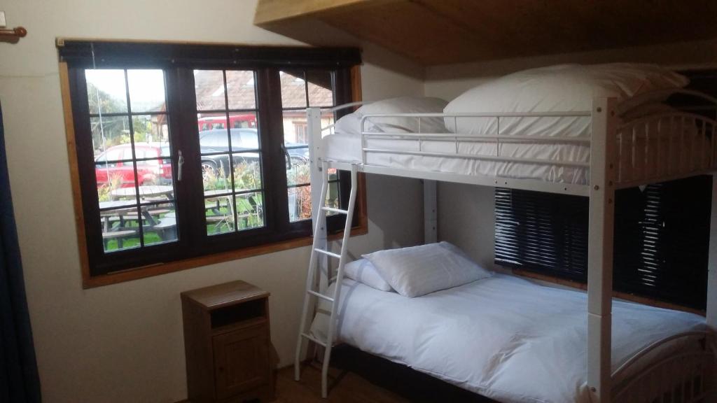 Postel nebo postele na pokoji v ubytování Bridge Farm Guesthouse rooms