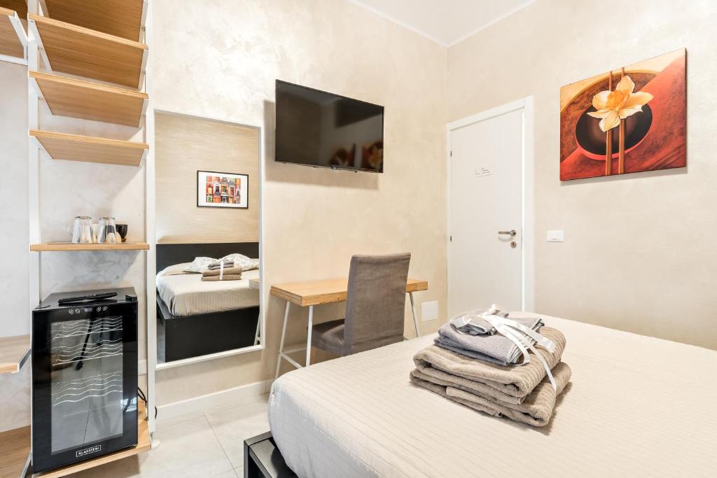 Postel nebo postele na pokoji v ubytování Gold House 2