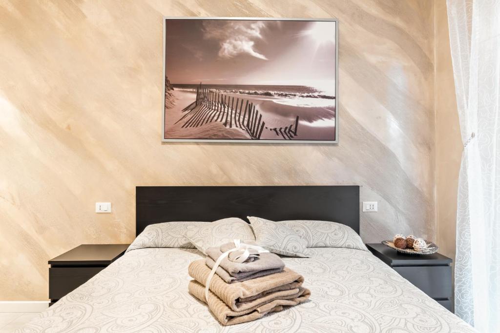 Postel nebo postele na pokoji v ubytování Gold House 2