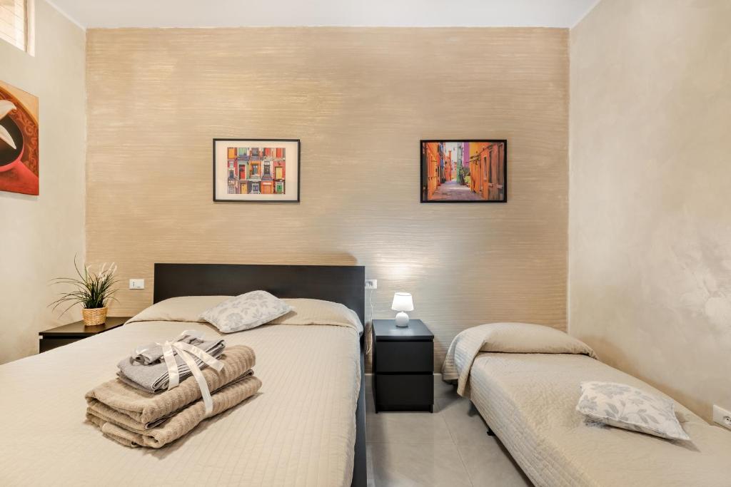 Postel nebo postele na pokoji v ubytování Gold House 2