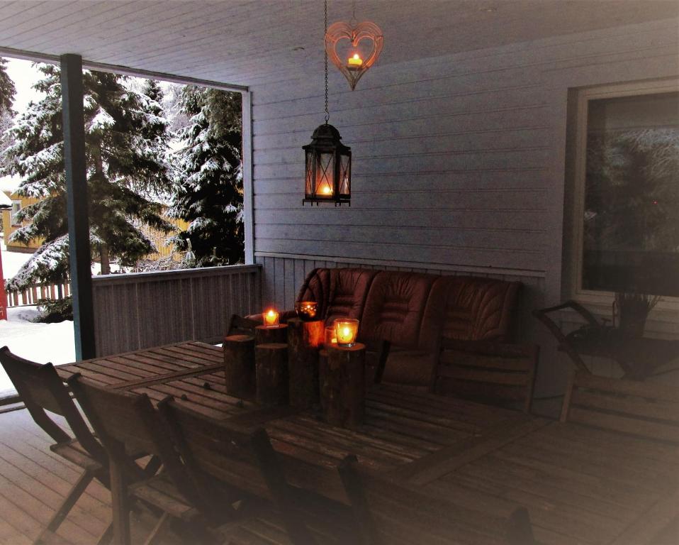 Posezení v ubytování Scandinavian Dream Cottages Vikajarvi- Rovaniemi