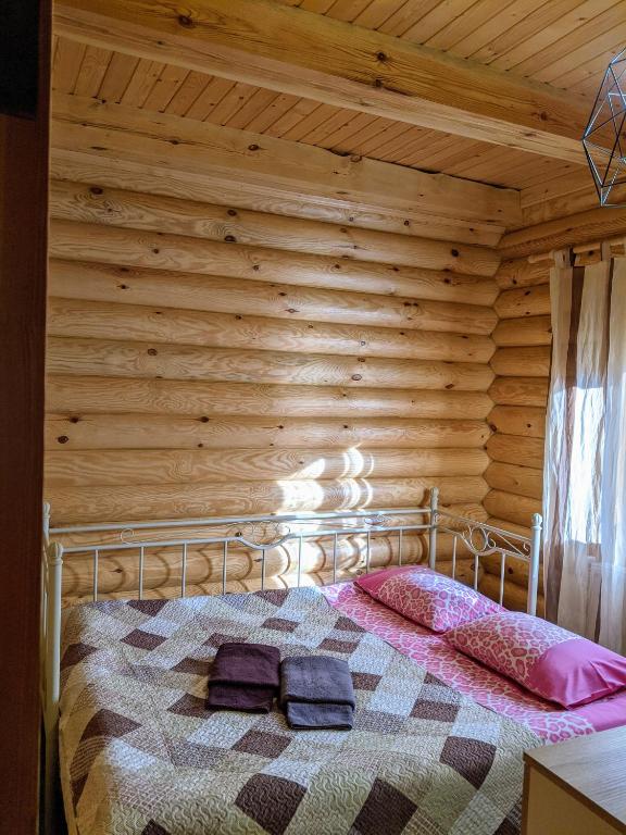 Postel nebo postele na pokoji v ubytování Asher