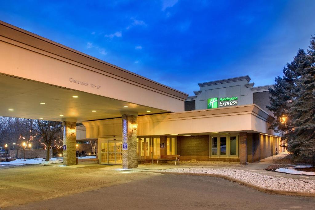 a building with a sign on the front of it at Holiday Inn Express Poughkeepsie, an IHG Hotel in Poughkeepsie