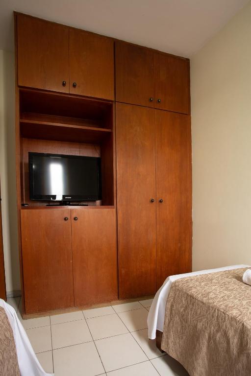 Postel nebo postele na pokoji v ubytování Pampulha Flat