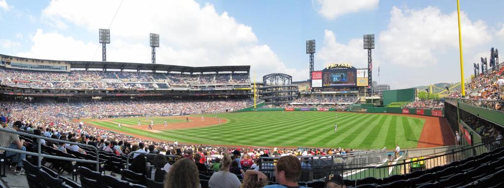 a crowd of people watching a baseball game at Holiday Inn Express & Suites Pittsburgh North Shore by IHG in Pittsburgh