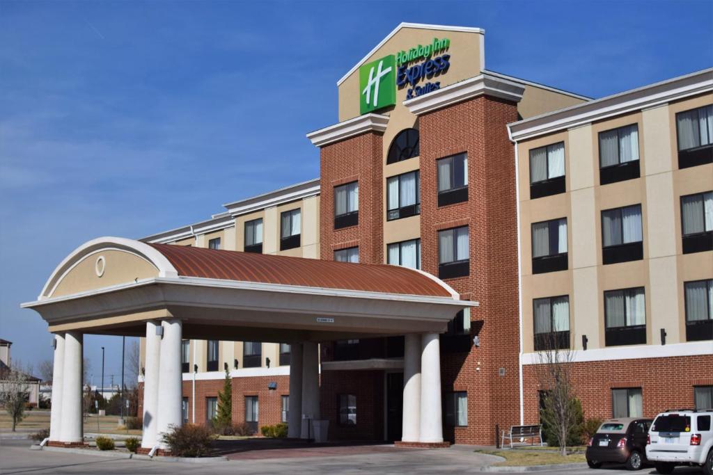 a hotel building with a gazebo in front of it at Holiday Inn Express Pratt, an IHG Hotel in Pratt