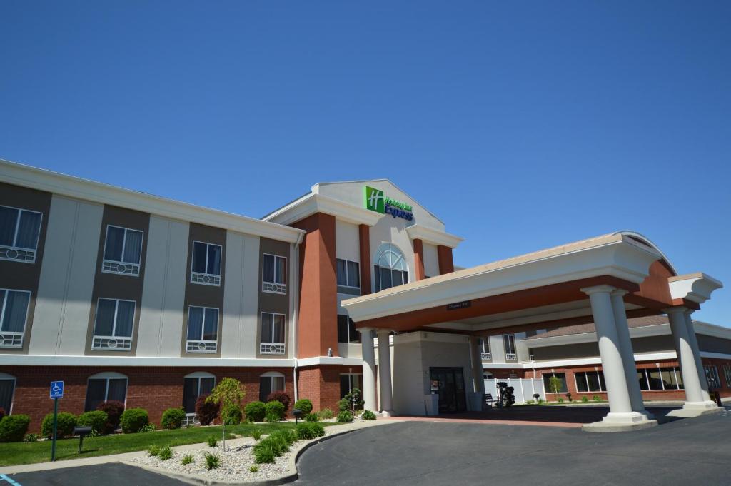 a large building with a large clock on the front of it at Holiday Inn Express Toledo-Oregon, an IHG Hotel in Oregon