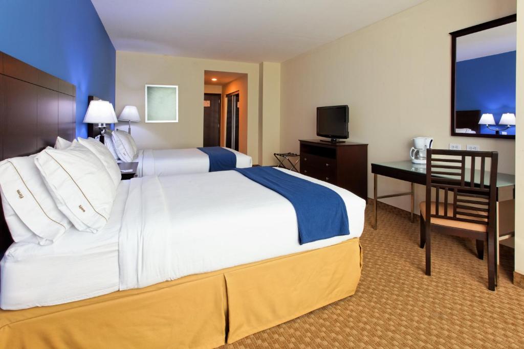 Postel nebo postele na pokoji v ubytování Intercity Hotels San Pedro Sula