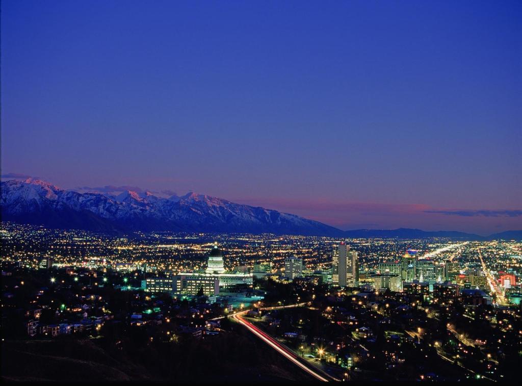 a view of a city at night with mountains at Holiday Inn Express Salt Lake City Downtown, an IHG Hotel in Salt Lake City