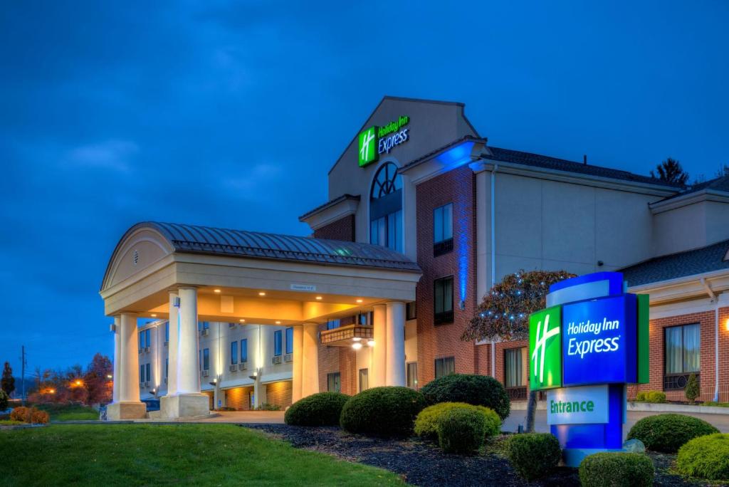 a hotel with a sign in front of a building at Holiday Inn Express Meadville (I-79 Exit 147a) by IHG in Meadville