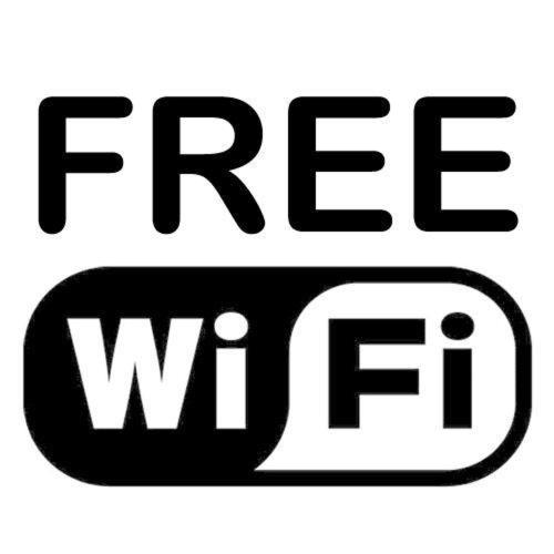 a black and white sign with the word free wifi at Hotel South Charleroi Airport in Charleroi